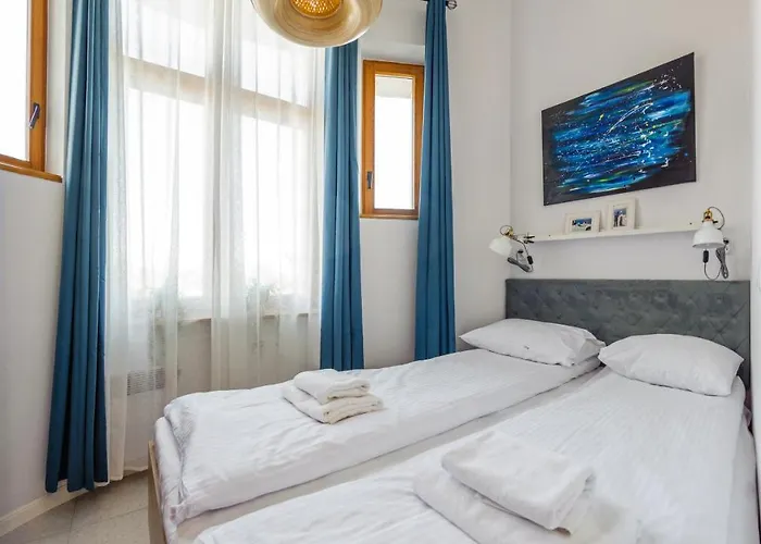 Traugutta Plaza, Sun & Snow Apartman *